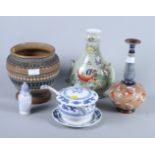A Doulton Slaters Patent Stoneware bottle vase, a Doulton Siliconware jardiniere and three pieces of