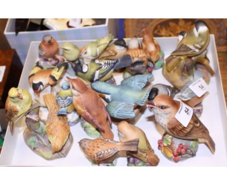 A collection of Worcester porcelain birds, nineteen approx (a/f)