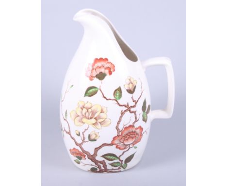 A mid 20th century Jessie Tait Midwinter "Ming Tree" lemonade jug with 'C' scroll handle, painted with floral decoration, 11"