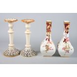 A pair of late 19th century square-section bottle vases, 12" high, and a pair of Continental