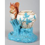 A late 19th century Worcester spill vase with squirrel, 6 1/2" high (restored ears) and a Hadley's
