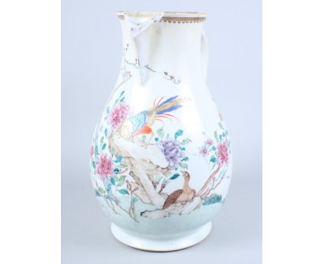 A 19th century Chinese exportware porcelain jug, decorated with a bird on a branch and "C" scroll handle, on circular foot, a