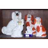 Five Staffordshire pottery dogs