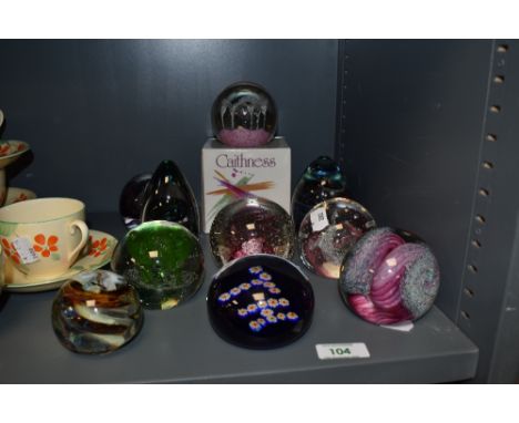 An assorted collection of art glass paperweights, by Liskeard, Caithness, Wedgwood, and Mdina
