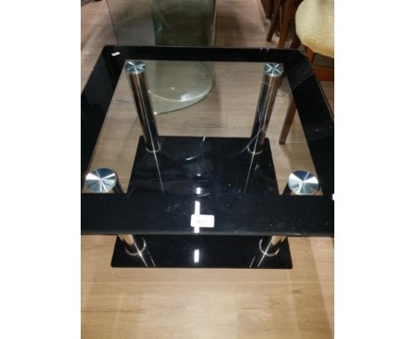 A MODERN GLASS AND CHROME  LAMP TABLE