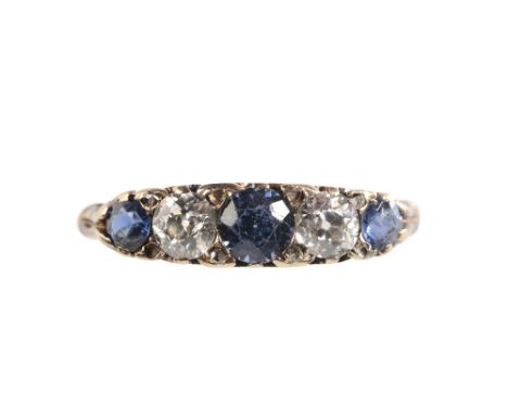 A FIVE STONE SAPPHIRE AND DIAMOND RING, the three circular cut sapphires, with two old brilliant cut diamonds in between, wit