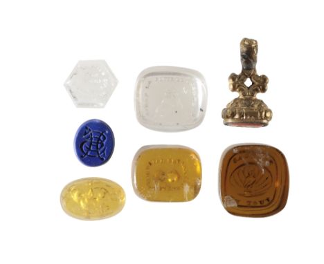 GROUP OF SEVEN INTAGLIO ENGRAVED GLASS TASSIE 'GEMS', late 18th or early 19th century, including a hexagonal clear example, B