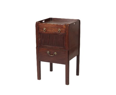 GEORGE III MAHOGANY TRAYTOP NIGHT COMMODE, the upper edging pierced for handles at both sides, the front with a drawer above 