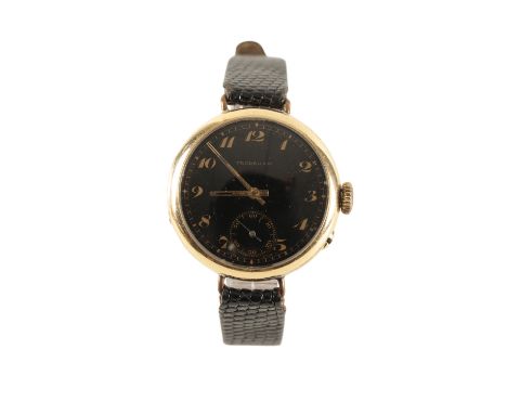 FRODSHAM 18CT GOLD GENTLEMAN'S TRENCH WRISTWATCH, circa 1940's, with manual wind movement, the black dial with subsidiary sec