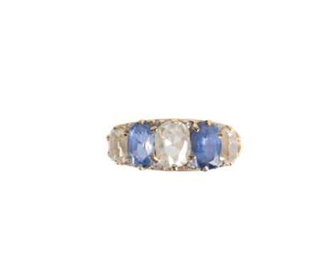 A FIVE STONE SAPPHIRE AND DIAMOND RING, three oval-cut diamonds divided by two oval cut sapphires, on an unmarked yellow gold