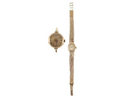 TISSOT 9CT GOLD LADY'S BRACELET WATCH with manual wind movement, the silver dial with gold baton numerals and dark blue steel