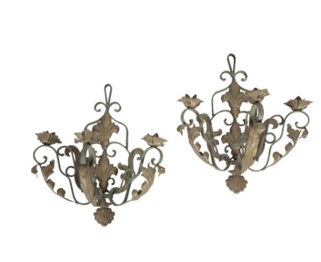 PAIR OF CONTINENTAL POLYCHROME PAINTED WROUGHT IRON THREE LIGHT WALL APPLIQUES, 20th century, the sockets with pressed metal 
