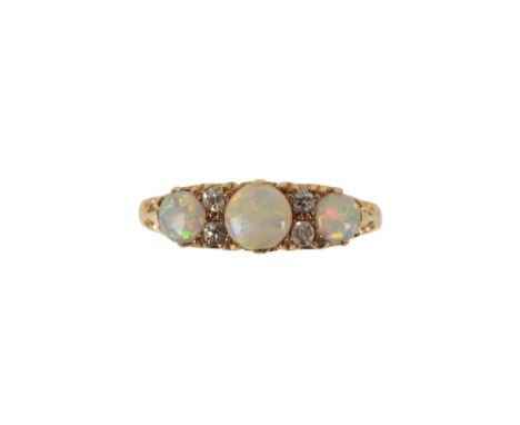 EDWARDIAN 18 CARAT GOLD OPAL AND DIAMOND RING, the three circular cabochon opals with old cut diamonds in between, stamped 18