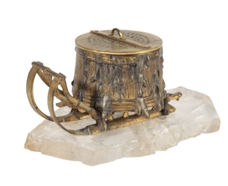RUSSIAN ORMOLU AND ROCK CRYSTAL MOUNTED ENCRIER, late 19th century, modelled as an overflowing barrel on a sled, the pan cove