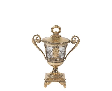 FRENCH SILVER GILT AND GLASS MOUNTED TWIN HANDLED URN, circa 1820, the domed cover with foliate wreath finial, the scrolled h