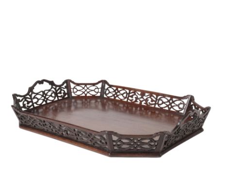 GEORGE III MAHOGANY TRAY IN CHINESE CHIPPENDALE STYLE, second half 18th century, of canted rectangular section, the angled op