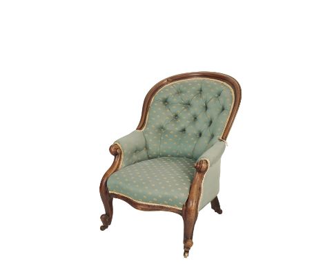 VICTORIAN WALNUT AND BUTTON UPHOLSTERED SPOON BACK ARMCHAIR, circa 1865, the arm rests with scrolled terminals above cabriole