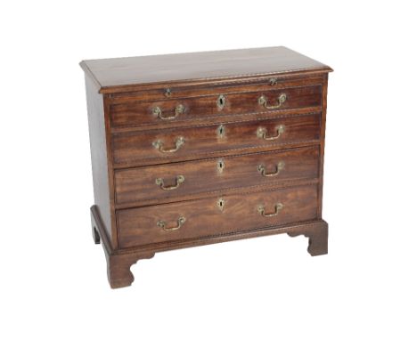 LATE GEORGE II / GEORGE III MAHOGANY BACHELOR'S CHEST, circa 1760, the top with ogee moulded edge, above a brushing slide and