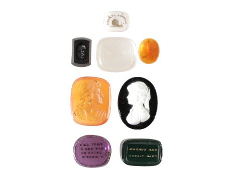 GROUP OF EIGHT INTAGLIO ENGRAVED GLASS TASSIE 'GEMS', late 18th or early 19th century, including a rectangular amethyst colou