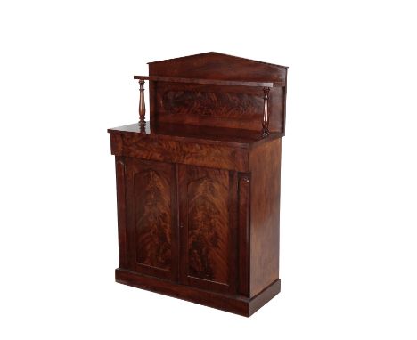 VICTORIAN MAHOGANY CHIFFONIER, circa 1870, with gallery shelf and a pediment above a frieze drawer, the twin doors below with