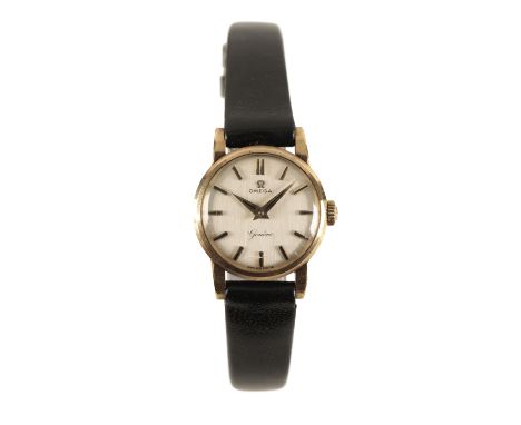 OMEGA GENEVE 9CT GOLD LADY'S WRISTWATCH, circa 1960's, with manual wind movement, the silver dial with gold baton numerals an