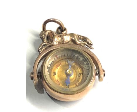 Antique 9ct gold swivel compass fob with horse top 7.2g 