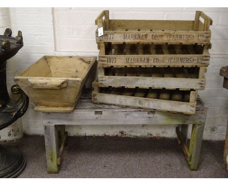 Wooden potting table, four vintage fruit and vegetable trays and a vintage wooden grain hopper