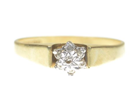 A diamond cluster ringThe round brilliant cut diamonds, claw set, to an 18k gold tapered shank, gross weight 3.6g, ring size 