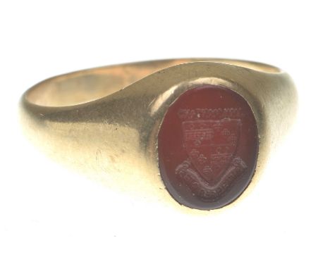 A carnelian seal ringThe oval carnelian engraved with an emblem, with the motto 'Esto Perpetua', stamped 10k, probably Americ