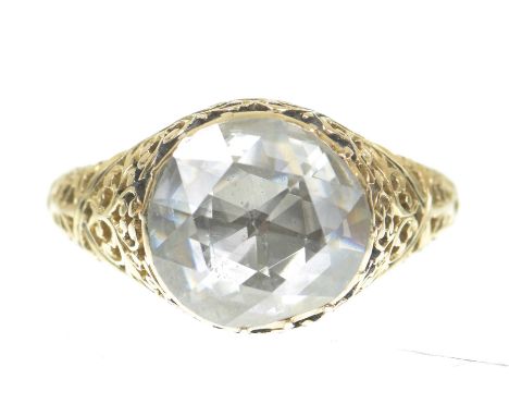 A late 19th Century continental diamond ringCentering an irregularly shape rose-cut diamond, to a closed and possibly foil ba