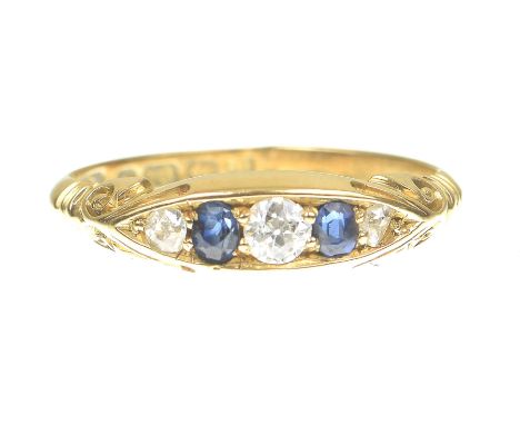 An early 20th Century sapphire and diamond ringOf navette form with alternate old cut diamonds and oval sapphires, with carve