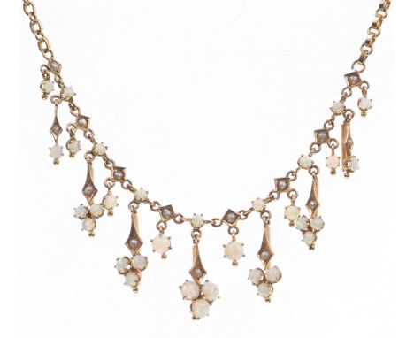 An early 20th Century continental opal and seed pearl fringe necklaceEach graduated suspended link composed of opal clusters 