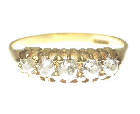 A diamond five stone ringThe graduated old mine cut diamonds, claw set, modelled in 14k gold, gross weight 3.9g, ring size R 