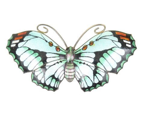 An early 20th Century silver and enamel broochRealistically modelled as a butterfly, with pale blue, green and red enamel dec