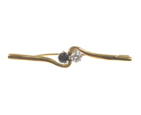 A sapphire and white paste broochThe circular sapphire and white paste to a 9k gold twist mount, length 4.3cm