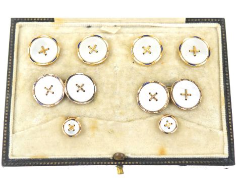 A cased set of mother of pearl and enamel cufflink and dress stud setDesigned as mother of pearl buttons, to a white and blue