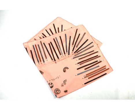 A Hermes 'A Vos crayons' silk scarfThe pink ground scarf, detailed with a series of pencils and shaving, 85cm x 85cm, sold wi