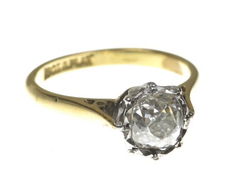 A diamond single stone ringThe old mine cut diamond to an illusion setting, the shank stamped PLAT and 18ct, total diamond we