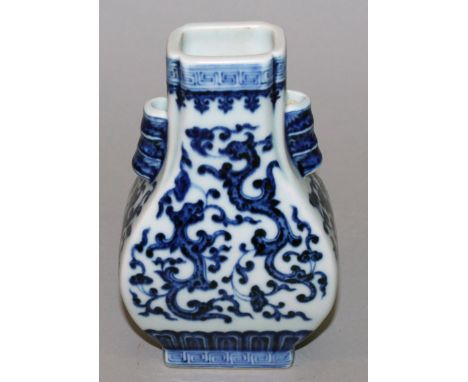 A CHINESE MING STYLE BLUE & WHITE PORCELAIN ARROW VASE, of Hu form, the base with a Qianlong seal mark, 6in high.