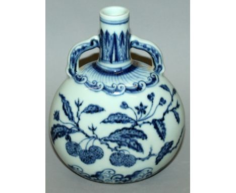 A CHINESE MING STYLE BLUE & WHITE PORCELAIN MOON FLASK, decorated with branches of fruit, the base with a four-character Xuan