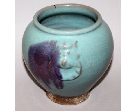 A CHINESE JUN WARE PURPLE SPLASH CERAMIC VASE, the sides moulded with double buddhistic lion & ring handles, the base unglaze