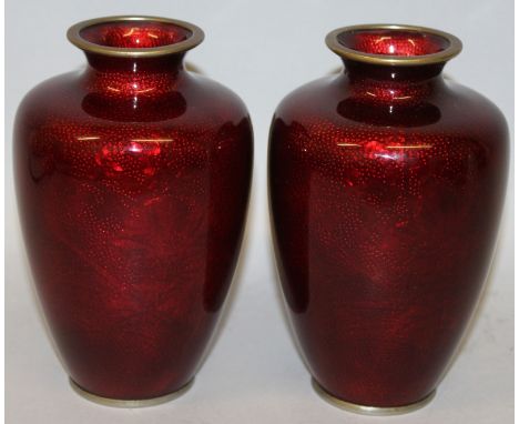 A PAIR OF EARLY 20TH CENTURY JAPANESE TAISHO PERIOD GIN BARI VASES, decorated in translucent red enamel over an embossed foli