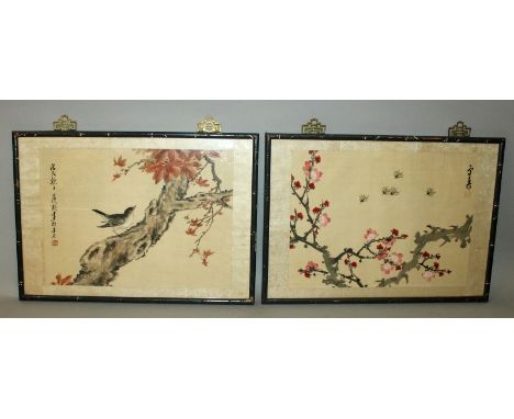 A PAIR OF 20TH CENTURY FRAMED CHINESE PAINTINGS ON SILK, one depicting a bird perched on a sloping tree trunk, the other with