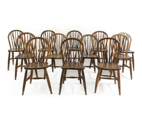 A harlequin set of twelve elm, ash and beech spindle back Windsor chairs of royal interest,19th century, 'including examples 