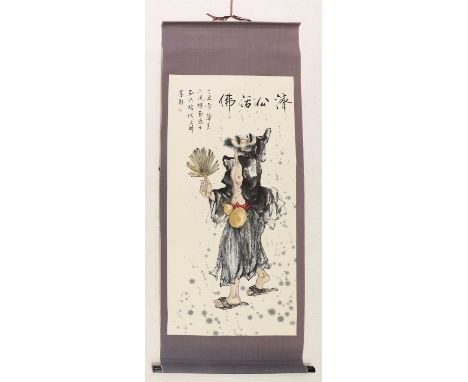 A Chinese hanging scroll,20th century, painted with Ji Gong in tattered monastic robes with a double gourd tied to his waist 