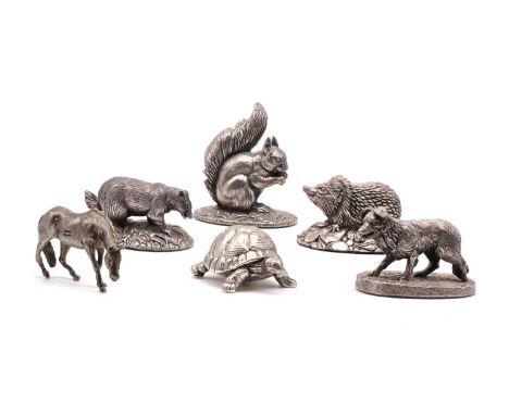 A collection of silver animals,by Camelot Silverware Ltd, Sheffield 1999 - 2014, comprising a dog, squirrel, hedgehog, badger