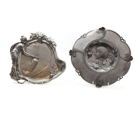 A WMF Art Nouveau pewter dish, of shaped from, cast as a maiden filling a pitcher from a fruiting vine, cast '252', and stamp