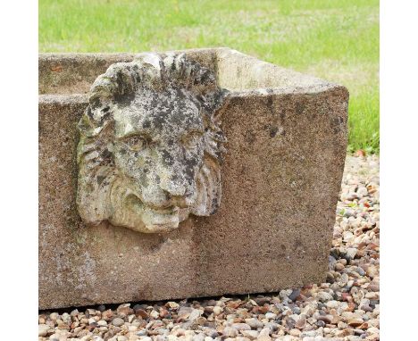 A composition rectangular trough,mounted with a lion's mask,74cm long54cm deep25cm highProvenance: The Jan Finch CollectionCo