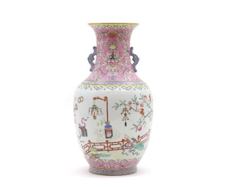 A Chinese famille rose vase,20th century, the tapering body rising from a circular foot to waisted neck, flanked by bat handl