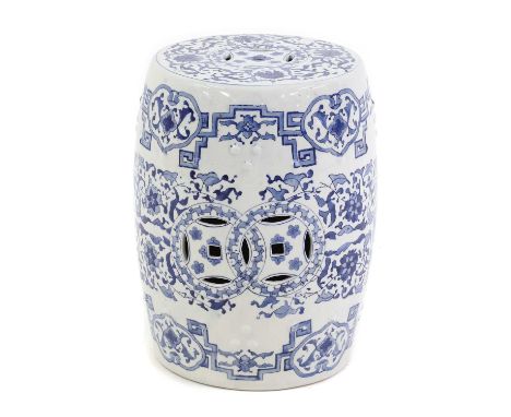 A Chinese blue and white garden porcelain garden seat,20th century, of barrel form with flowerhead and scrolling foliage deco